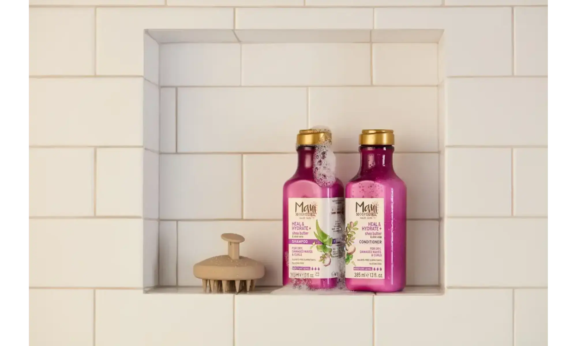 Maui Moisture® Heal & Hydrate + Shea Butter Shampoo and Conditioner Hair Care set in a shower