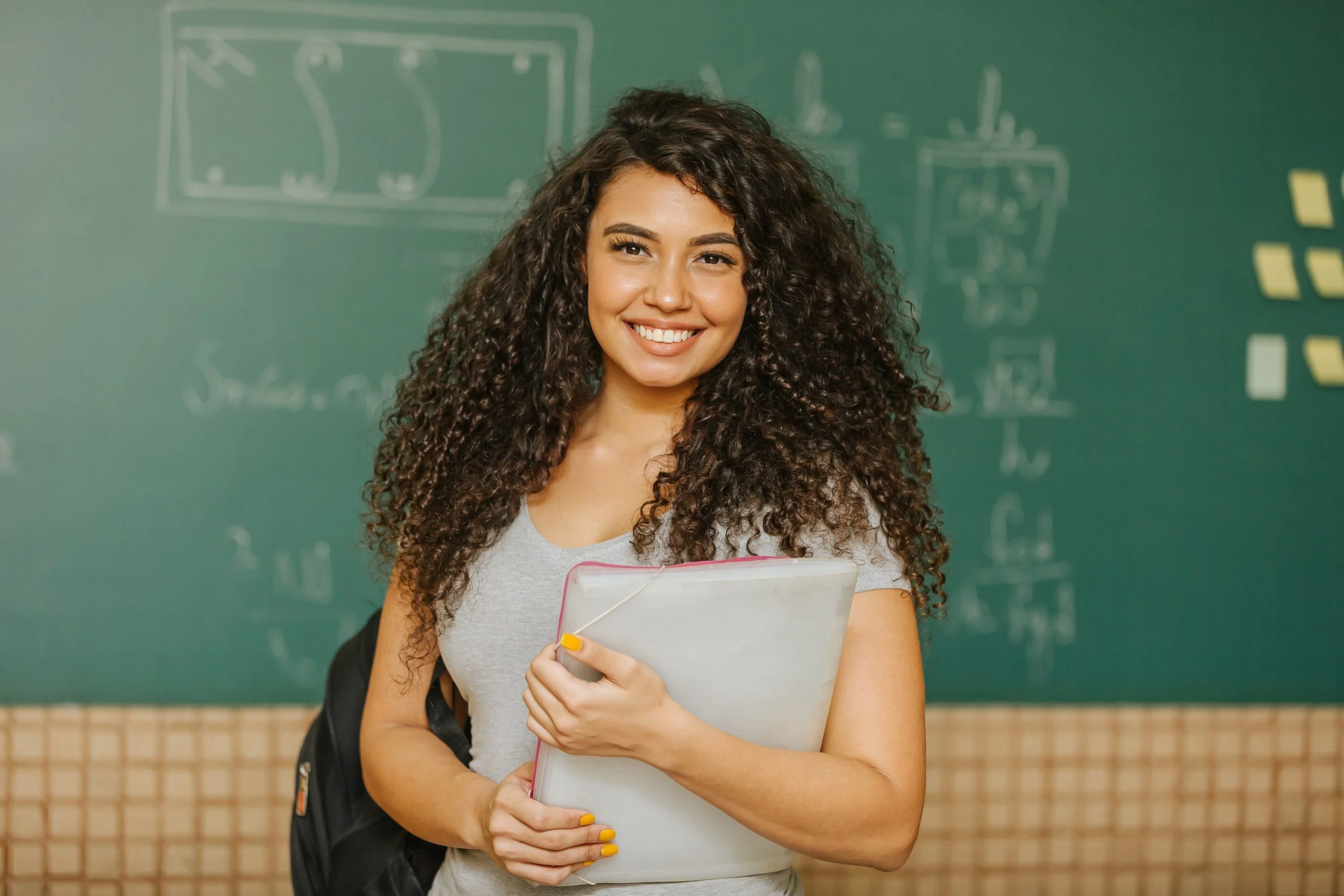 Maui Moisture talent with books and backpack at school 