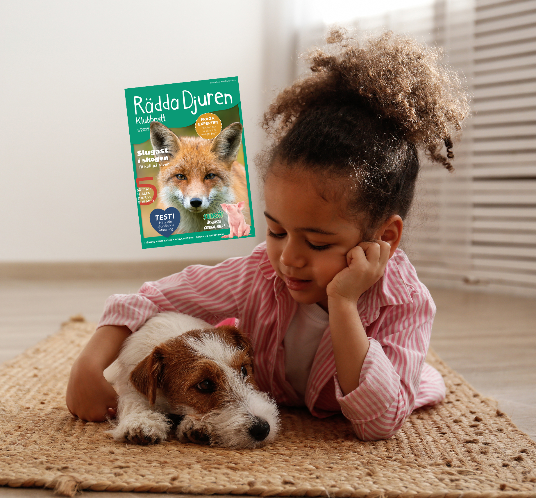 På bilden syns en flicka som håller om sin hund och vår klubbtidning Klubbnytt 