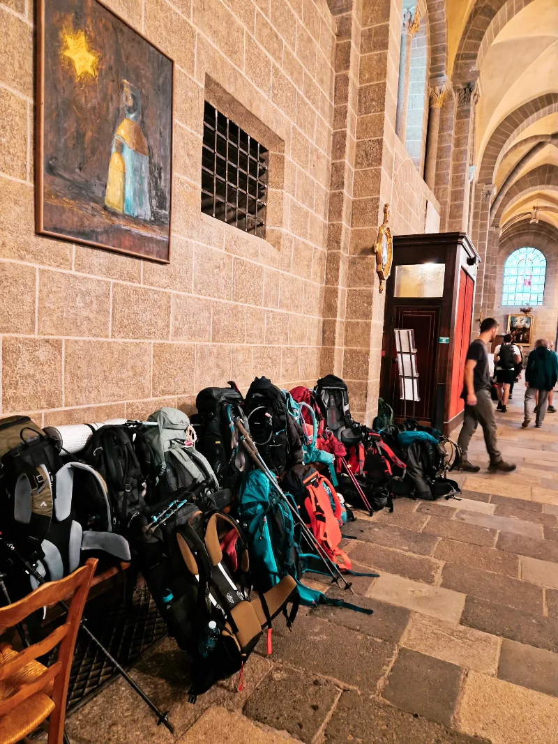 The backpacks of the pilgrims at Le Puy cathedral