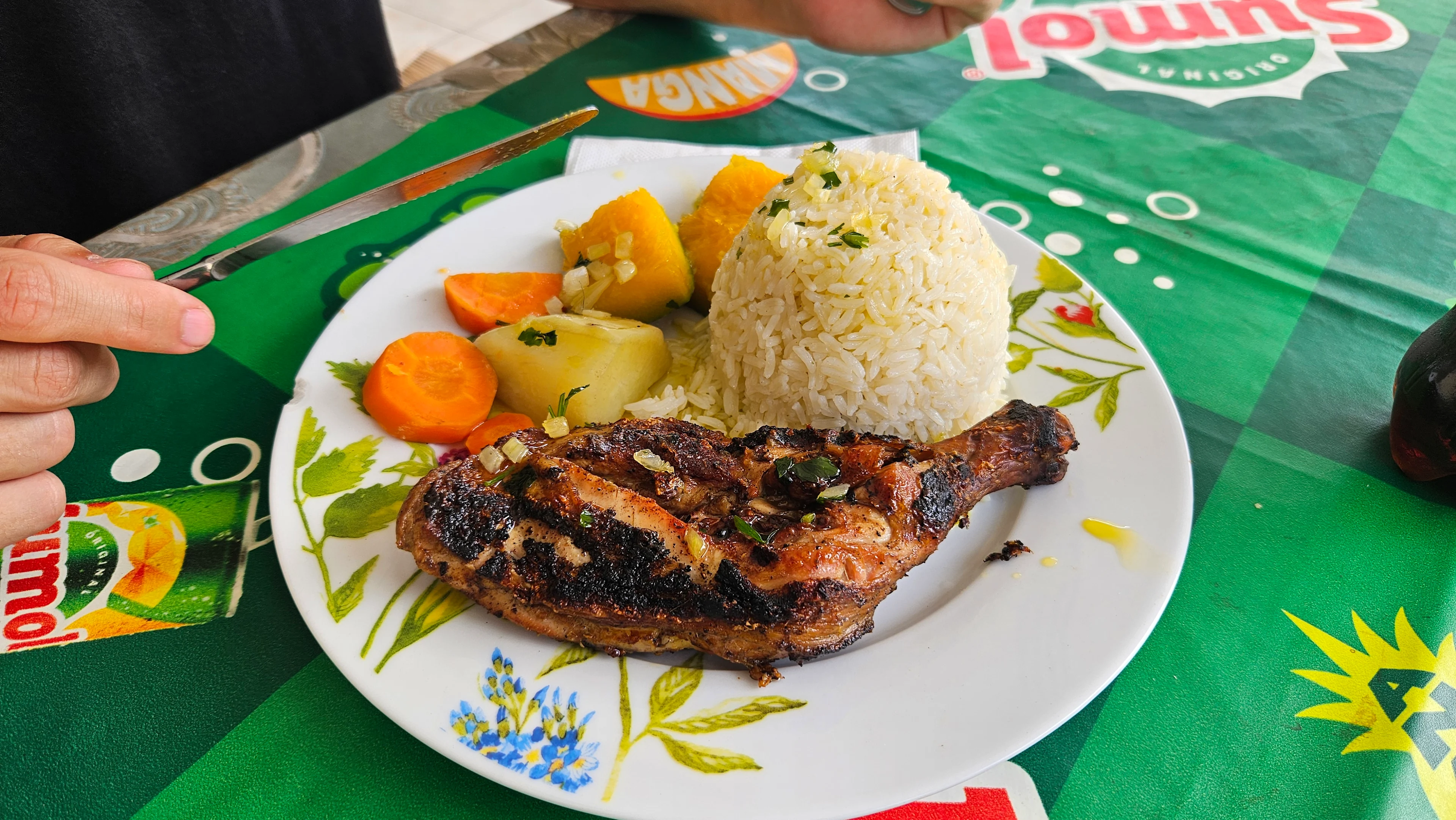 Market meal: Grilled chicken, vegetables, rice and beans