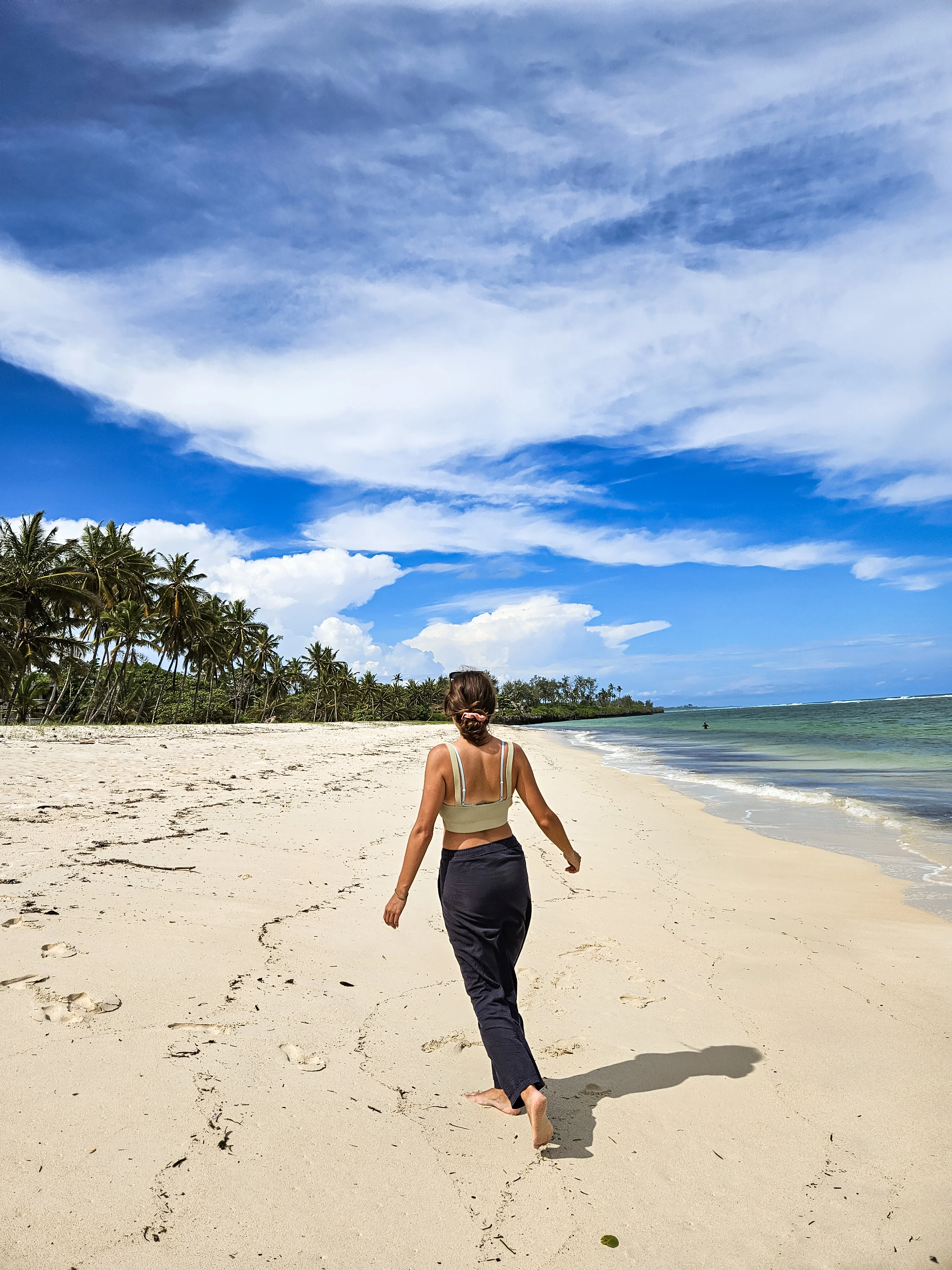 Lisa is happy on Tiwi Beach