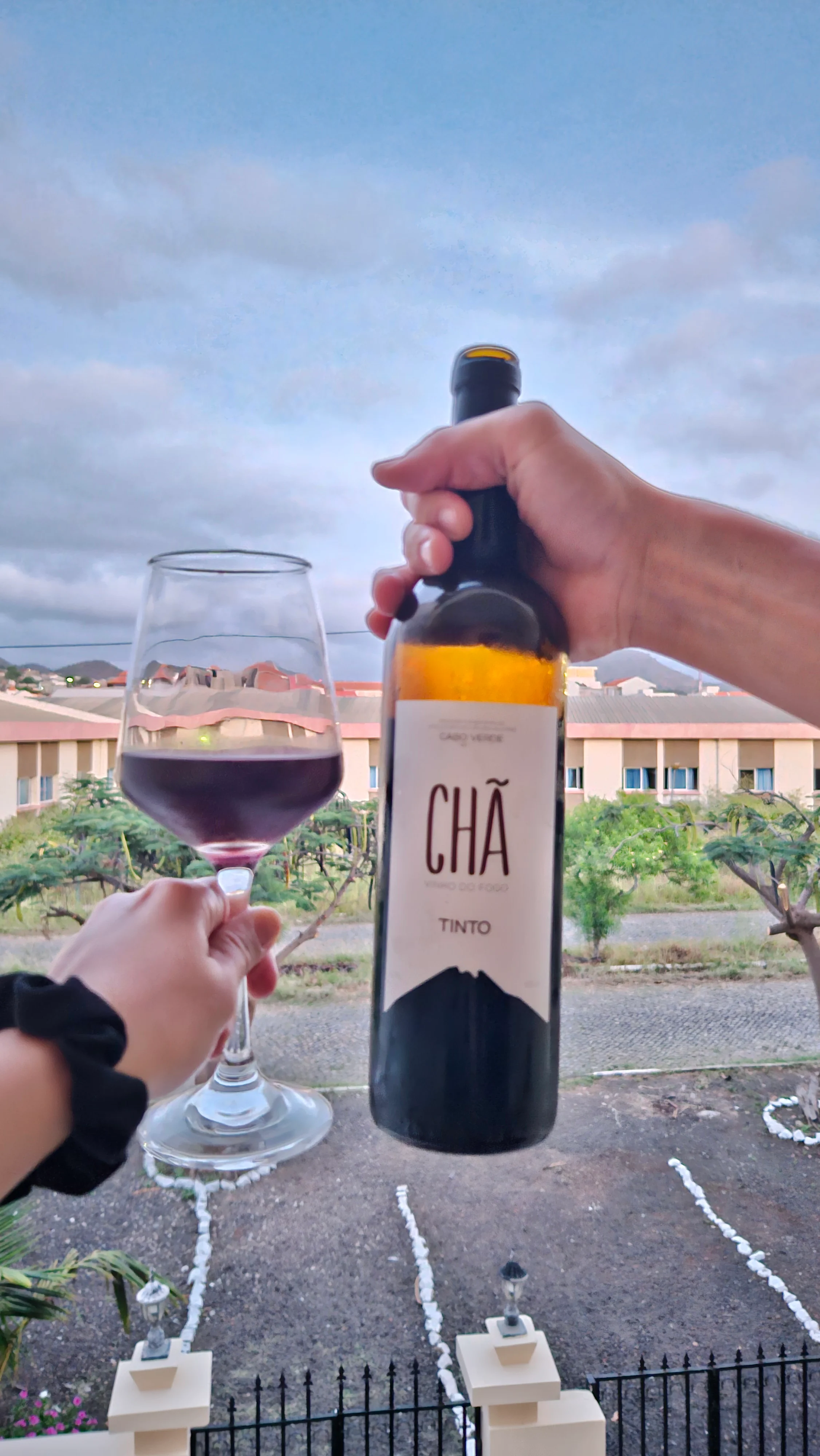 Drinking Chã de Fogo on our balcony