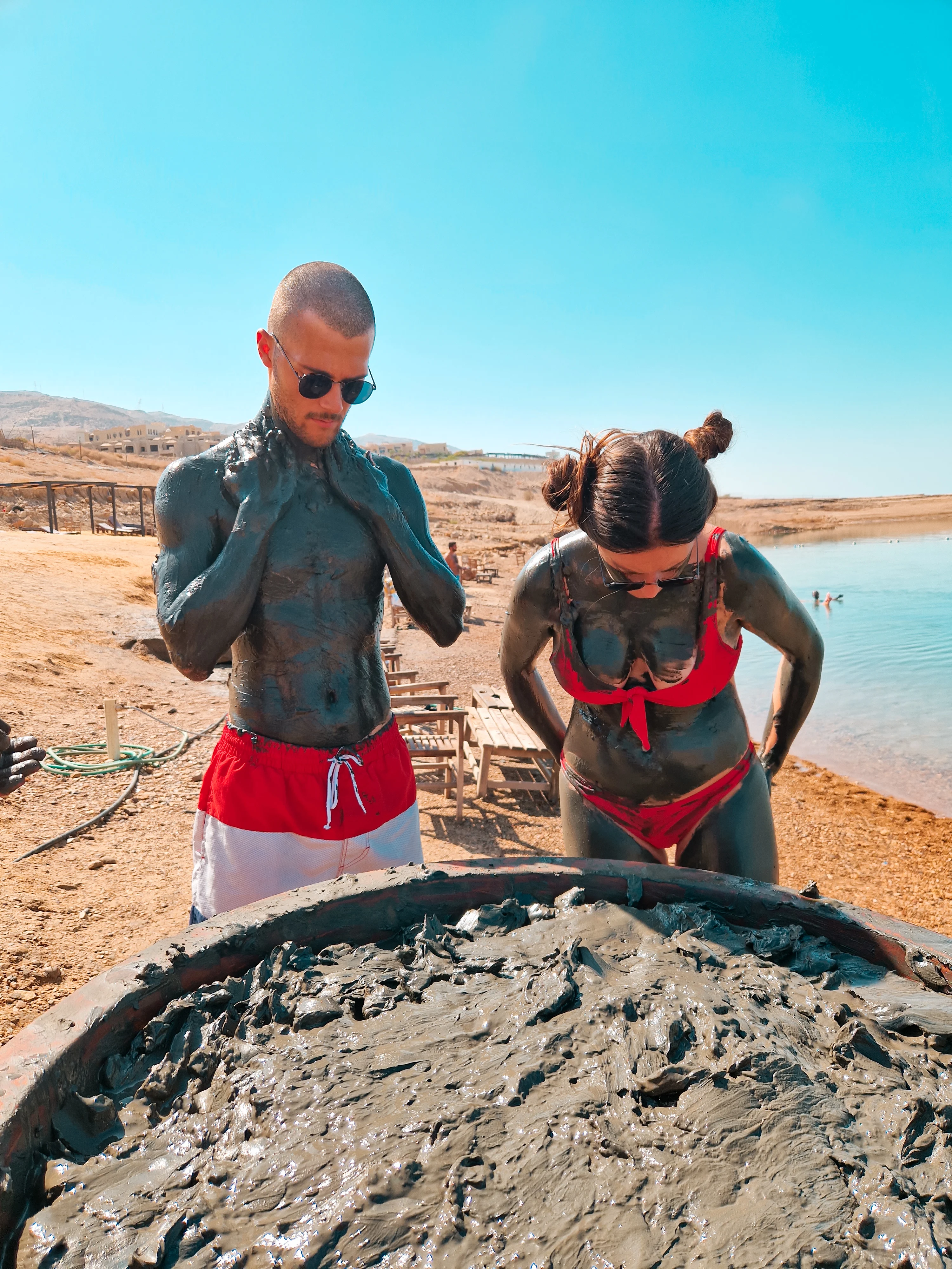 Mud bath on the Red Sea, Jordan