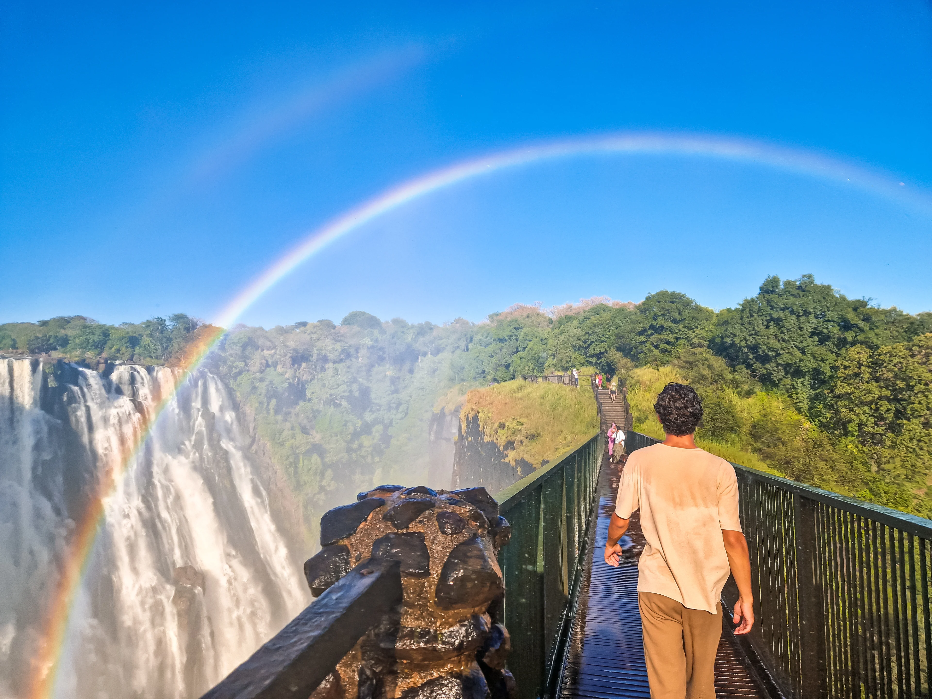 Crossing the rainbow bridge, overlooking the falls