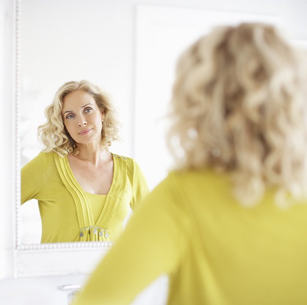 yellow dressed girl with curly hair