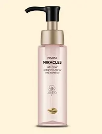 ミラクルズシルキーリペアヘアオイルの桃色のボトル
