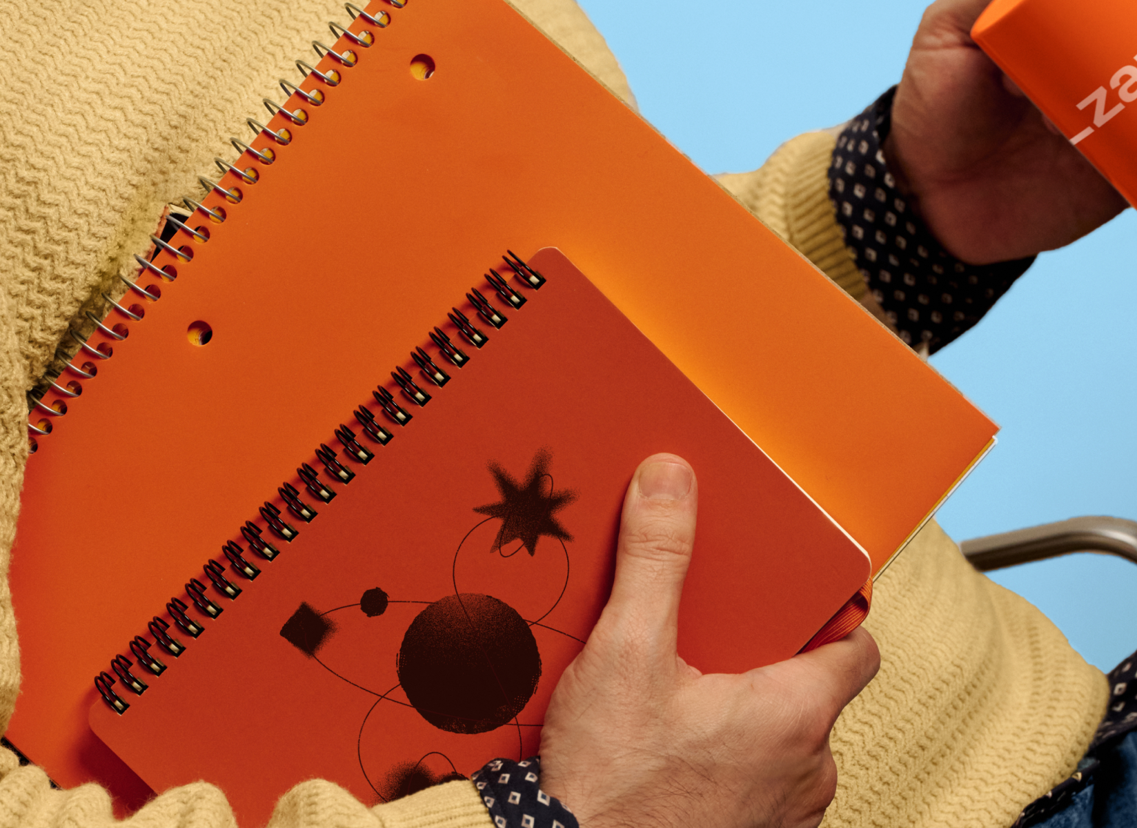 A photo of an AI playbook held by Phil