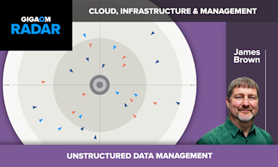 # GigaOm Radar Report: Unstructured Data Management

This image is a cover slide or title graphic for a **GigaOm Radar** report focused on **Unstructured Data Management** within the **Cloud, Infrastructure & Management** category.

## Key Elements:

- **GigaOm Radar Logo**: Displayed prominently in the upper left corner in white and blue text on a black background

- **Radar Visualization**: The central graphic shows a traditional radar-style circular diagram with concentric rings in gray tones, featuring small triangular markers (in blue and orange/red) positioned at various points, representing different vendors or solutions plotted according to their capabilities

- **Author**: **James Brown** is credited as the analyst, with his professional headshot shown on the right side of the image. He appears to be a middle-aged man with gray hair and beard, wearing a dark green button-up shirt

- **Color Scheme**: Purple, gray, black, and white dominate the design, consistent with GigaOm's branding

This type of radar report typically evaluates and compares various enterprise technology solutions in the unstructured data management space, helping IT decision-makers understand market positioning of different vendors.
