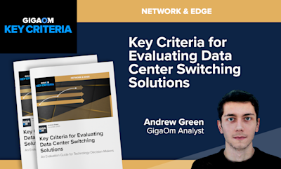 # Image Caption

This is a promotional graphic from **GigaOm**, a technology research and analysis company, featuring their "Key Criteria" report series.

## Content Details

**Title:** "Key Criteria for Evaluating Data Center Switching Solutions"

**Category:** Network & Edge

**Author:** Andrew Green, GigaOm Analyst (pictured on the right side of the image - a young man with dark hair wearing a black shirt)

**Publication Date:** December 2025

**Subtitle:** "An Evaluation Guide for Technology Decision-Makers"

## Visual Elements

The image displays:
- The GigaOm "Key Criteria" branding in the upper left corner (white and blue text on black background)
- A gold/tan header bar with "NETWORK & EDGE" designation
- Multiple overlapping report cover mockups shown at an angle, featuring abstract arrow graphics on a dark background
- The main title in large white text against a dark navy blue background
- A professional headshot of the analyst Andrew Green

This appears to be marketing material for an industry analyst report designed to help IT professionals evaluate data center networking switch vendors and solutions.