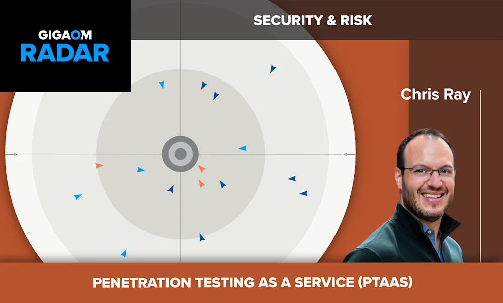 The image shows a slide from a presentation titled "Penetration Testing as a Service (PTaaS)" under the "Security & Risk" section. The slide includes a radar chart with various blue triangles pointing in different directions, likely indicating different risk or security factors being assessed.
To the right of the radar chart is a headshot of a smiling man with short brown hair and a beard, wearing glasses and a blue collared shirt. His name is listed as Chris Ray, presumably the presenter or an expert on the topic.
The overall slide design uses an orange and gray color scheme, with the "GigaOm Radar" logo in the top left corner, suggesting this is from a GigaOm analyst presentation evaluating PTaaS offerings or the market landscape.