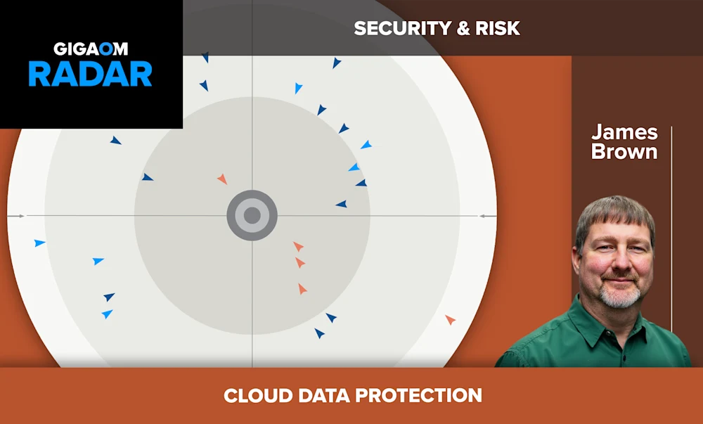 The image shows a section titled "SECURITY & RISK" with the heading "CLOUD DATA PROTECTION". It displays a radar chart with various blue and red triangles pointing inward from the circumference of the circular chart. At the bottom right is a photo of a smiling man with short gray hair and a green shirt, captioned "James Brown".