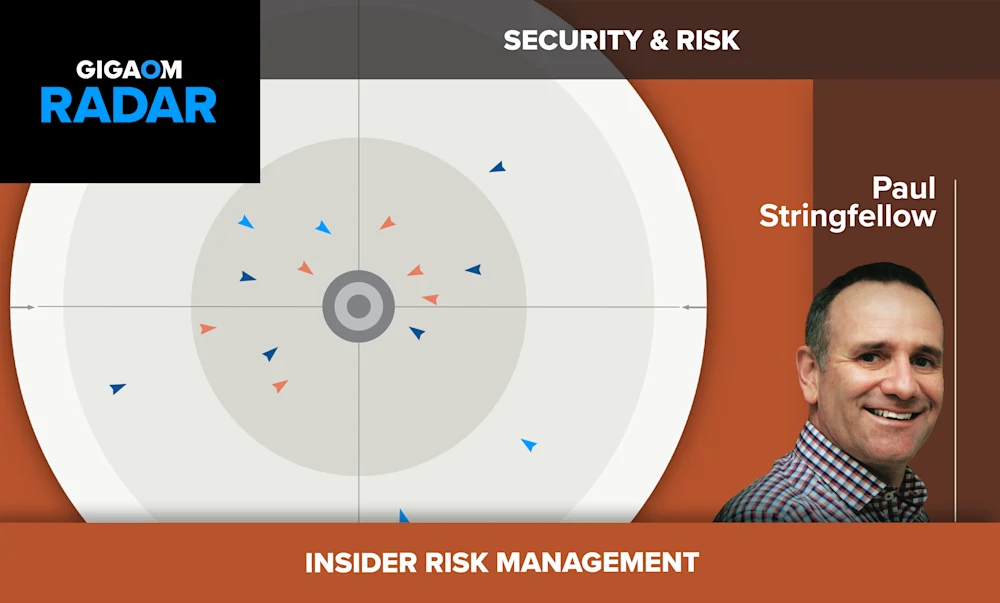 The image shows a slide from a presentation about security and risk, specifically "Insider Risk Management". The slide includes a radar chart with various data points plotted, likely representing different risk factors or metrics related to insider threats within an organization.
On the right side of the slide is a headshot photo of a smiling man in a collared shirt, presumably the presenter or an expert on the topic, Paul Stringfellow.
The color scheme uses shades of orange and gray, giving it a professional look suitable for a corporate presentation. The "GIGAOM RADAR" logo in the top left suggests this may be from a larger industry report or analysis series.
Overall, the slide conveys a message about taking a data-driven approach to assessing and mitigating risks posed by insiders, such as employees or contractors, to an organization's security. The radar visualization provides a succinct way to compare multiple risk dimensions.