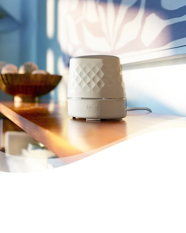 A Plug Scent Booster on a dresser. A Plug Scent Booster on a dresser.