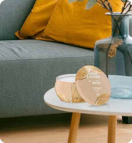 Soothe & Restore candle on a table