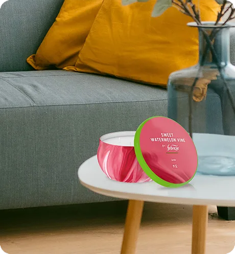 Sweet watermelon vine candle sitting on a table