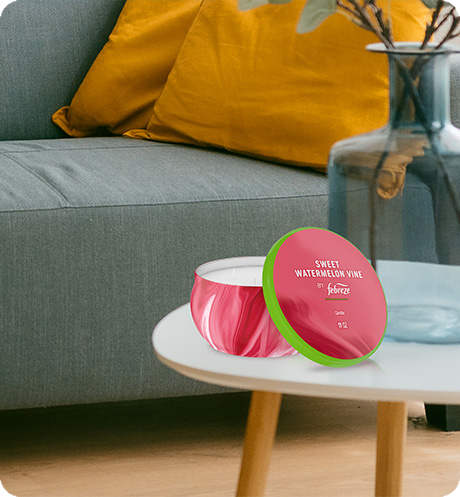 Sweet watermelon vine candle sitting on a table