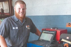 Mechanic with open tool drawer