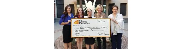 Large check donated to the Fresh Start Womens Foundation