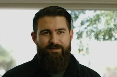 Man with a beard.
