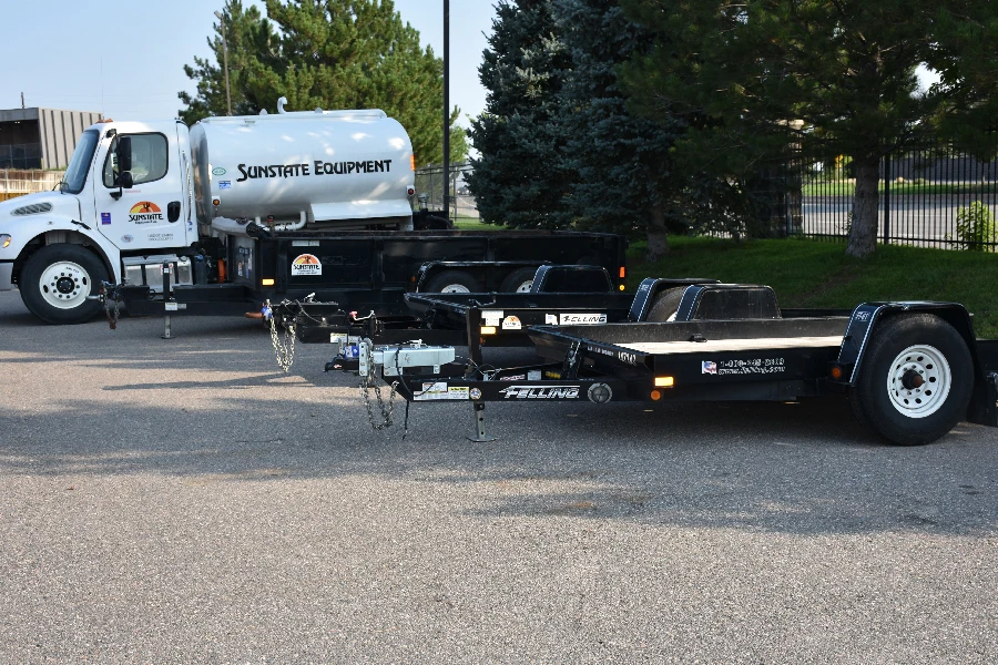 Towable utility trailers on the Sunstate lot, available for rent