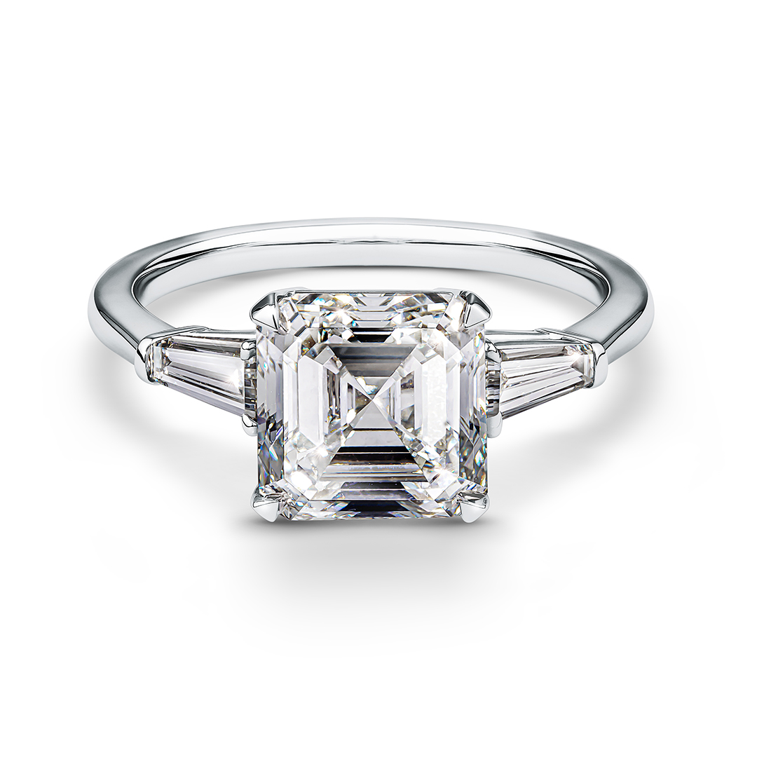 white gold ring with asscher diamond on white background