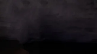 A black background with smoke effect at the top