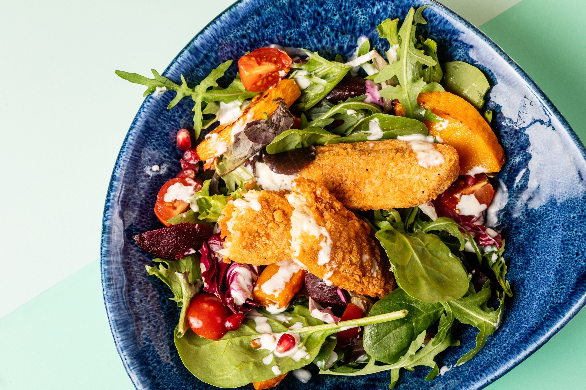 ChiQin Crispy Strips with salad in a bowl