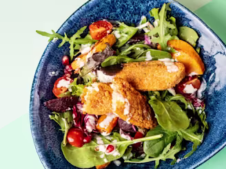 ChiQin Crispy Strips with salad in a bowl