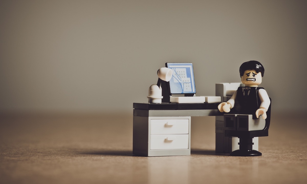 a toy figurine on a desk