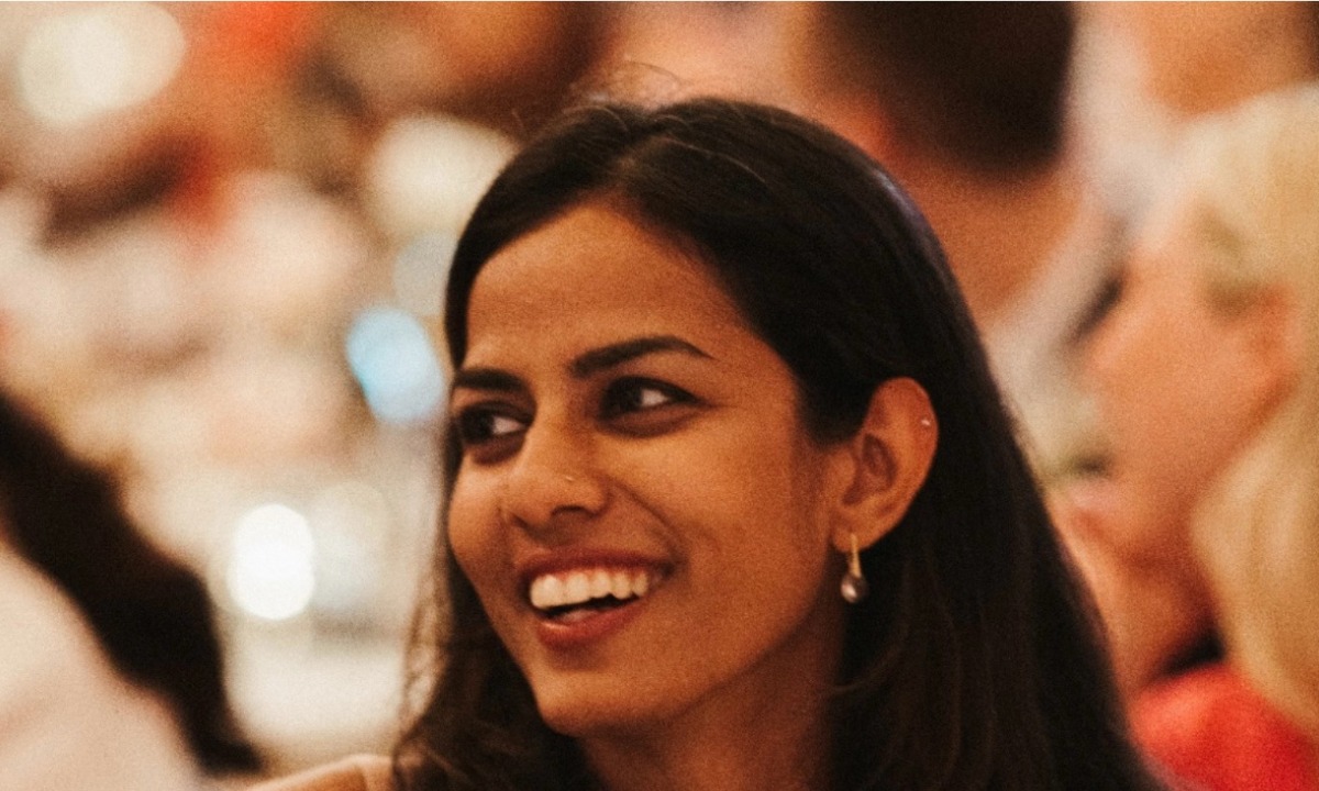 a woman smiling for the camera