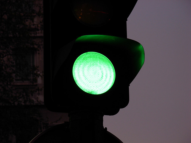 a traffic light with a green light