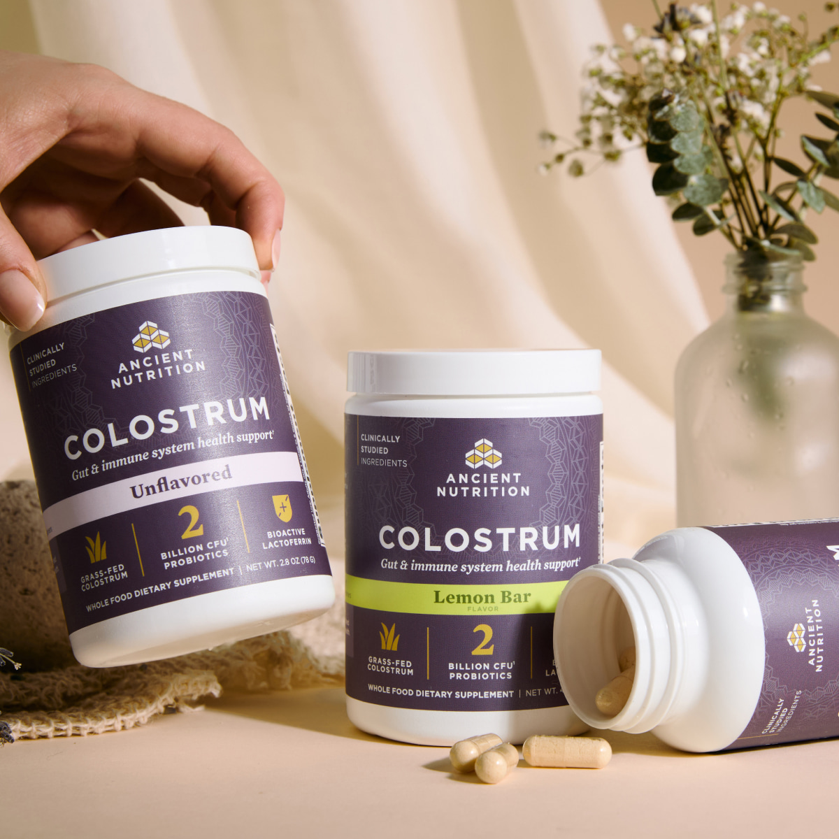 three colostrum products with a plant