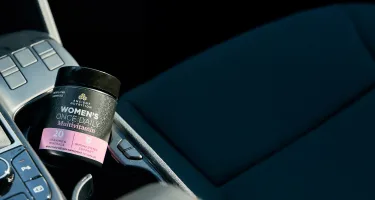 Women's Multivitamin Once Daily in a car console