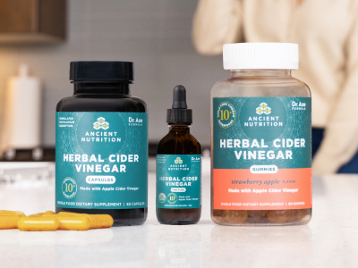 herbal cider vinegar capsules, tincture and gummies on a counter