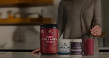 products on a kitchen counter next to a berry smoothie