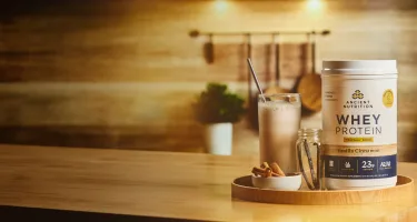 a bottle of whey protein + fat loss
