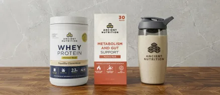 metabolism and gut support bundle on a wood surface