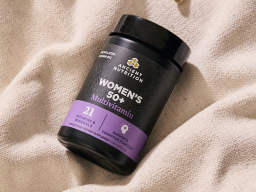 Women's 50+ Multivitamin on canvas background
