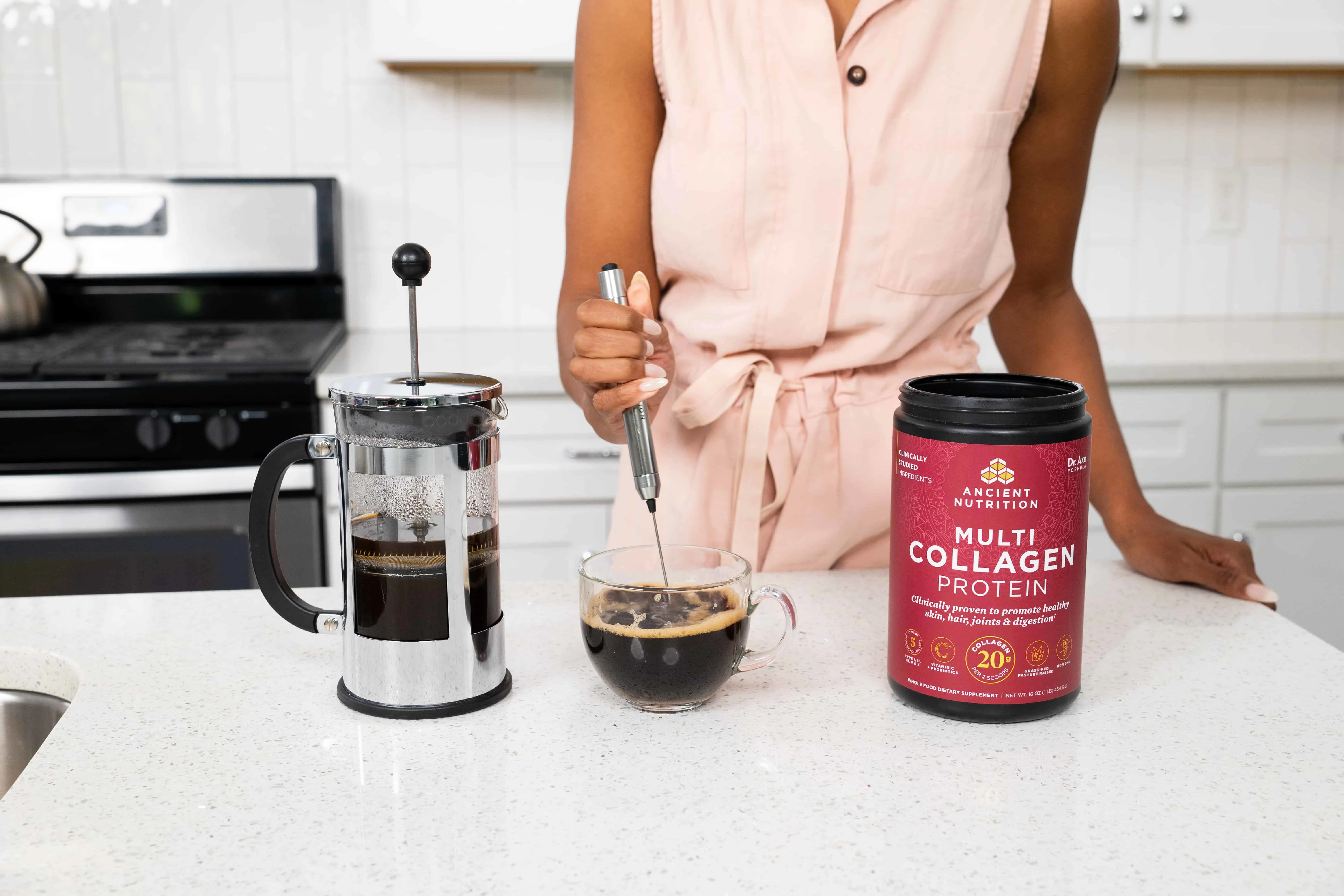 multi collagen protein next to a french press