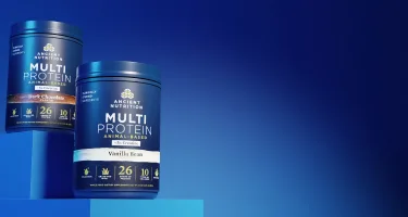 multi protein + creatine product bottles on a dark blue background