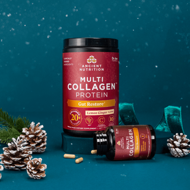 Multi Collagen Powder and Capsules Gut Restore on a dark blue background with pinecones