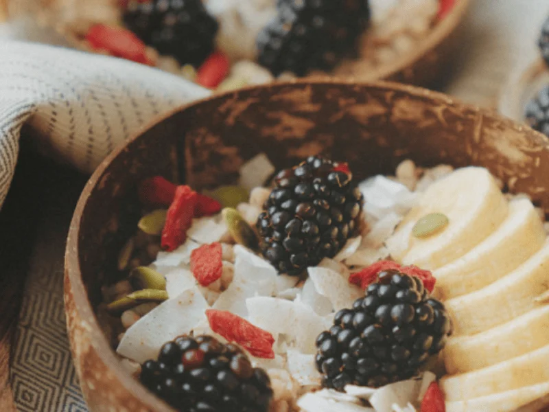 a bowl of fruit and nuts
