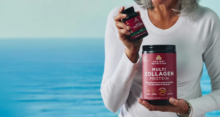 a woman holding multi collagen protein