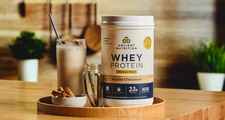 A bottle of Whey Protein Fat Loss on a kitchen counter