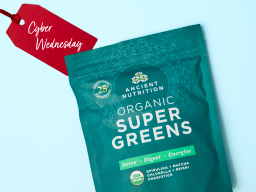 organic supergreens 50serv bag on a teal background