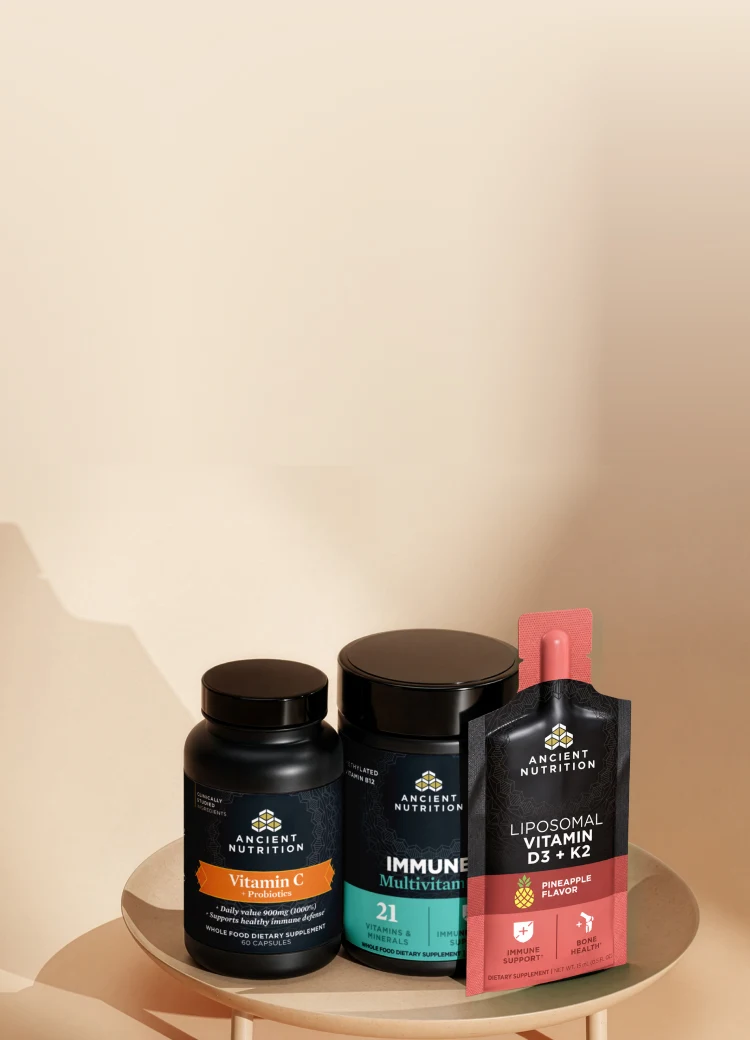 Three ancient nutrition items on a tan background