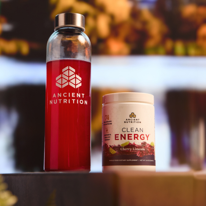 a water bottle with ancient nutrition clean energy powder in it