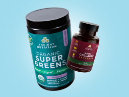 Bottles of Ancient Nutrition New Organic SuperGreens Berry and Multi Collagen Advanced Lean Capsules on blue background.