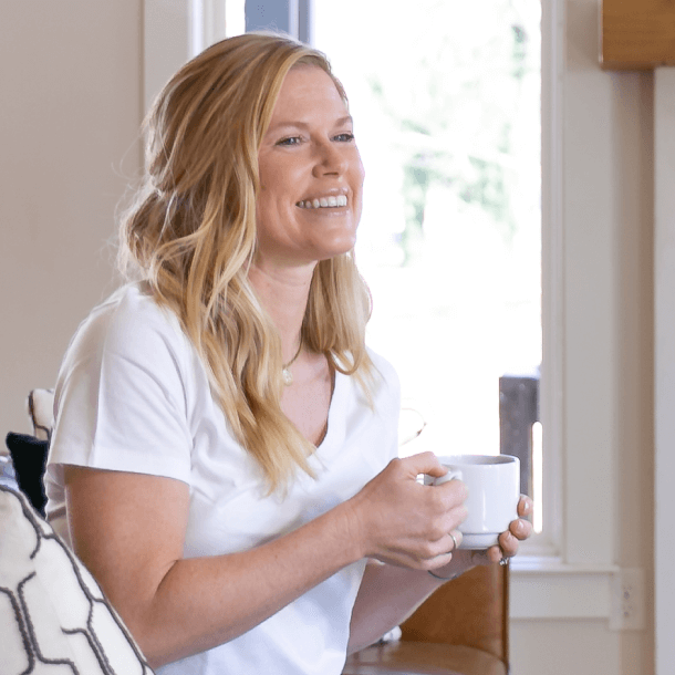 woman with white coffee cup